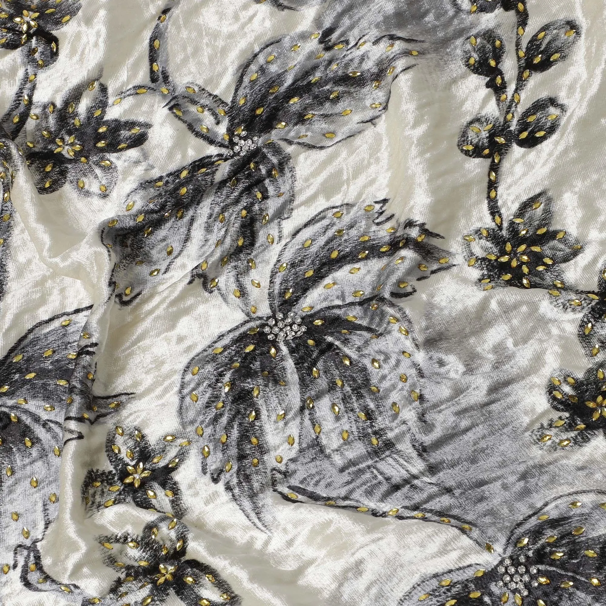 Macaroon Beige Rayon velvet fabric with charcoal grey print having green and silver stonework in floral design